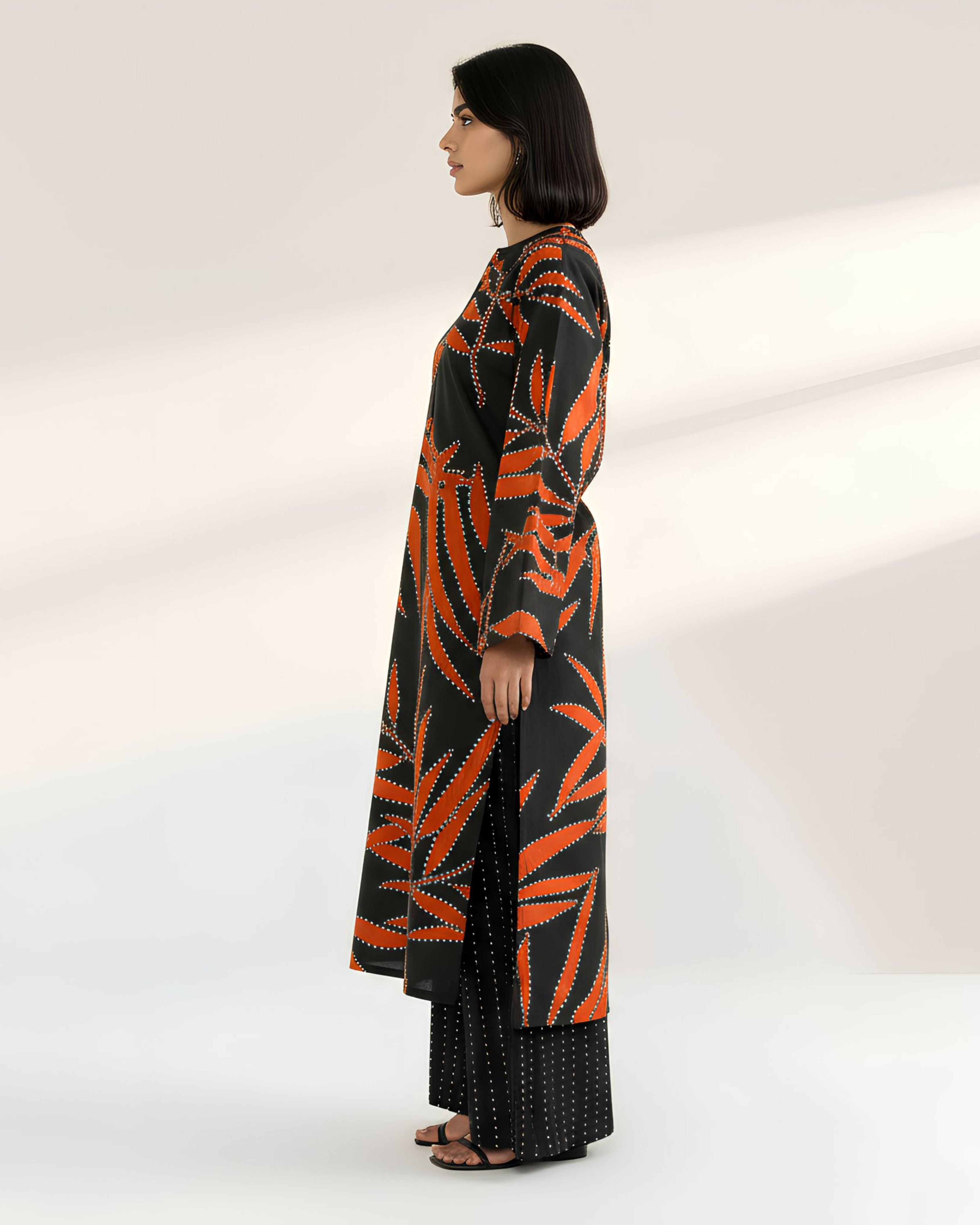 2 Pcs Unstitched Printed Suit